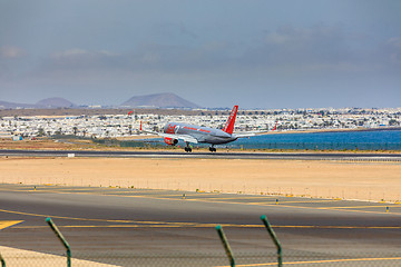 Image showing ARECIFE, SPAIN - APRIL, 15 2017: Boeing 757 - 200 of JET2 with t