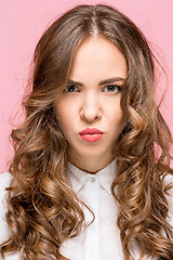 Image showing Portrait of young woman with shocked facial expression