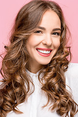 Image showing The young woman\'s portrait with happy emotions