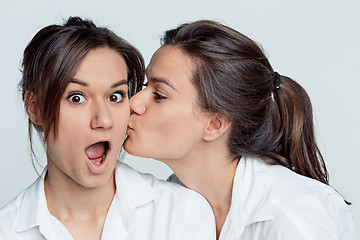 Image showing Studio portrait of female twins