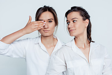 Image showing Studio portrait of female twins