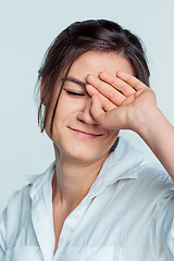 Image showing The young woman\'s portrait with thoughtful emotions