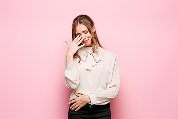 Image showing Portrait of young woman with shocked facial expression