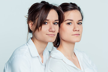 Image showing Studio portrait of female twins