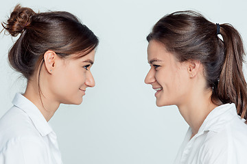 Image showing Studio portrait of female twins