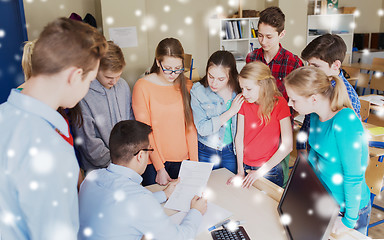 Image showing group of students and teacher with tests at school