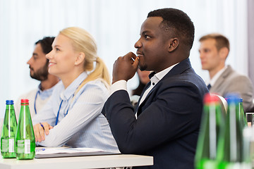 Image showing happy business team at international conference