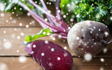 Image showing close up of sliced beet on wood