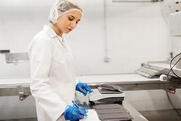 Image showing woman working at ice cream factory