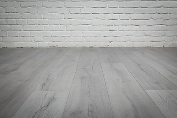 Image showing Old white brick wall and wood floor background