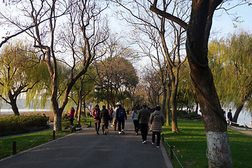 Image showing People walk around the beautiful scenic area in West lake in Han