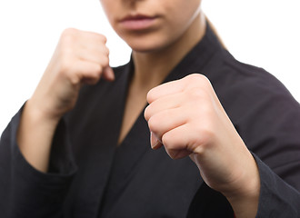 Image showing Young woman is ready to fight