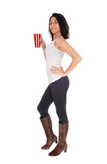 Image showing Beautiful Hispanic woman with red coffee mug.