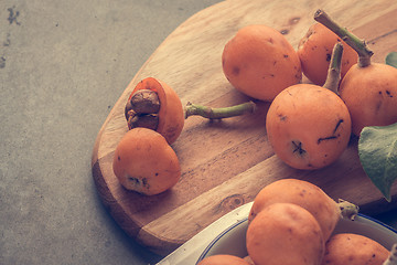 Image showing loquats on kitchen counter