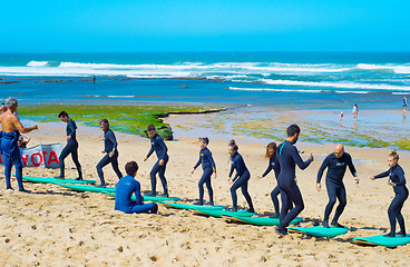 Image showing Surf training on the beach