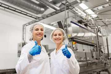 Image showing happy women technologists at ice cream factory