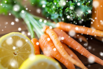 Image showing close up of carrot, lemon and lettuce