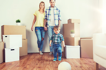 Image showing happy family moving to new home and playing ball