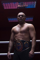 Image showing kick boxer with his championship belt