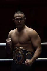 Image showing kick boxer with his championship belt