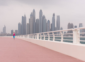 Image showing woman running on the promenade