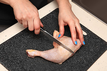 Image showing cook who cooks chicken