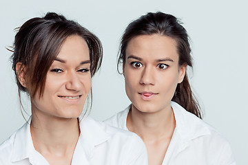 Image showing Studio portrait of female twins