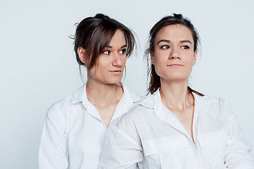 Image showing Studio portrait of female twins