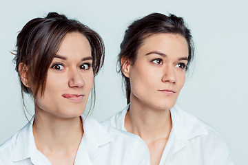 Image showing Studio portrait of female twins