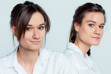 Image showing Studio portrait of female twins