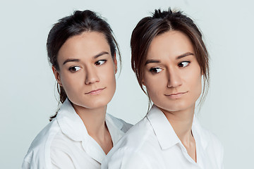 Image showing Studio portrait of female twins