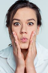 Image showing Portrait of young woman with shocked facial expression