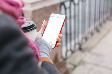 Image showing Woman using smartphone at river