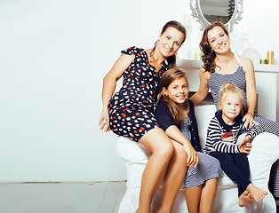 Image showing young pretty modern family at home happy smiling, lifestyle peop