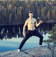 Image showing middle age man doing sport yoga on the top of the mountain, lifestyle people outdoor, summer wild nature for training 