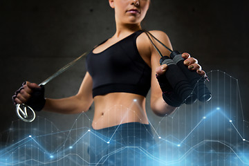 Image showing sporty woman with jumping rope