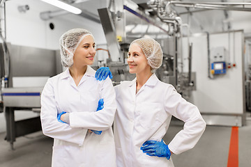 Image showing happy women technologists at ice cream factory