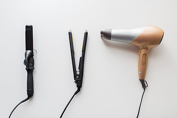 Image showing hairdryer, hot styler and curling iron or tongs