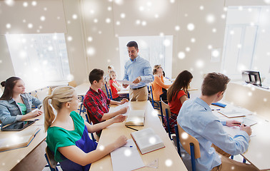 Image showing group of students and teacher with test results