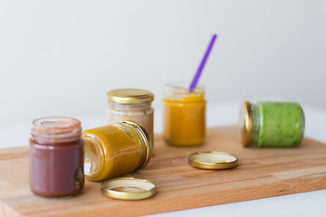 Image showing vegetable or fruit puree or baby food in jars