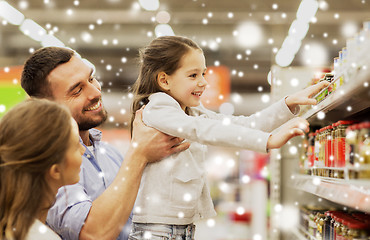 Image showing happy family buying food at grocery store