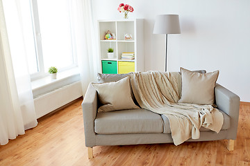 Image showing sofa with cushions at cozy home living room