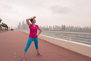 Image showing woman stretching and warming up