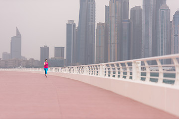 Image showing woman running on the promenade