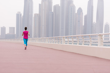 Image showing woman running on the promenade