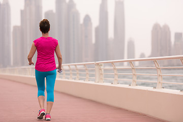 Image showing young woman celebrating a successful training run