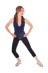 Image showing Exercising woman with her hands on hip