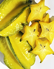 Image showing delicious carambola asian exotic fruit on white background isola