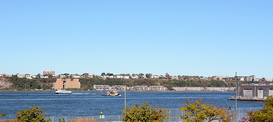 Image showing Ferry and work boat navigating the Hudson River 