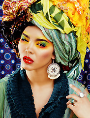 Image showing beauty bright woman with creative make up, many shawls on head l